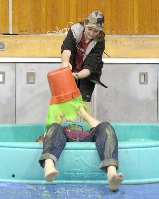 Sydney Neal, who raised over $465 for the Slime Challenge, got to slime Mr. McCullough (NAEC VP). Photo by Sasha Berndt